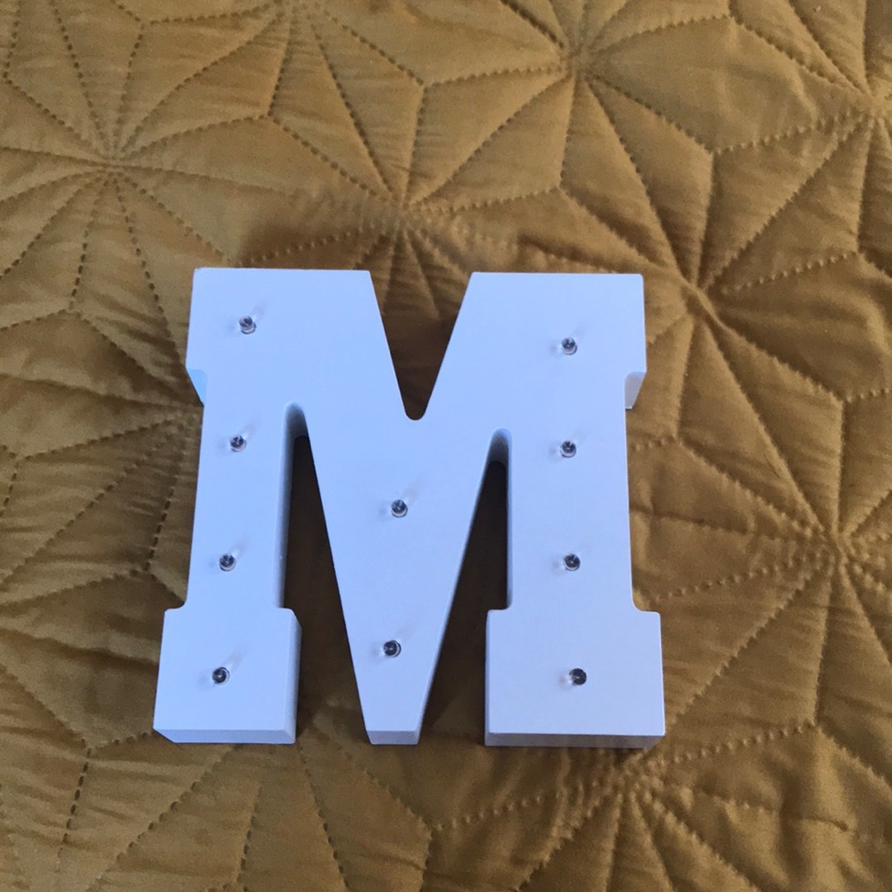 Hanging light up wooden “M”